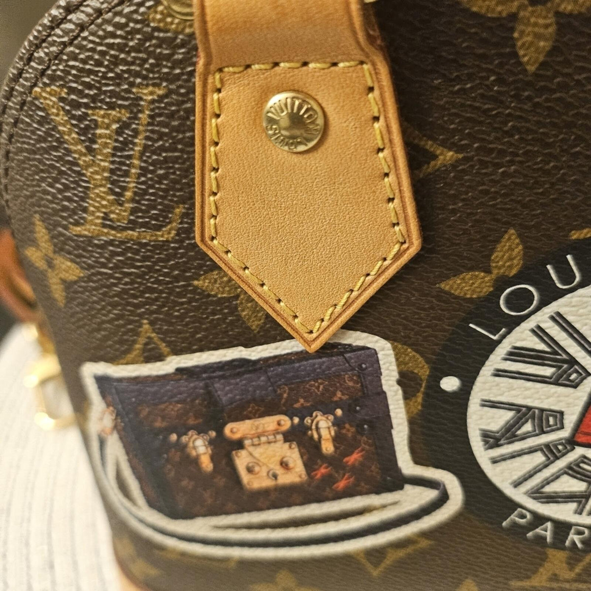 Louis Vuitton Alma BB World Tour Monogram Crossbody Bag