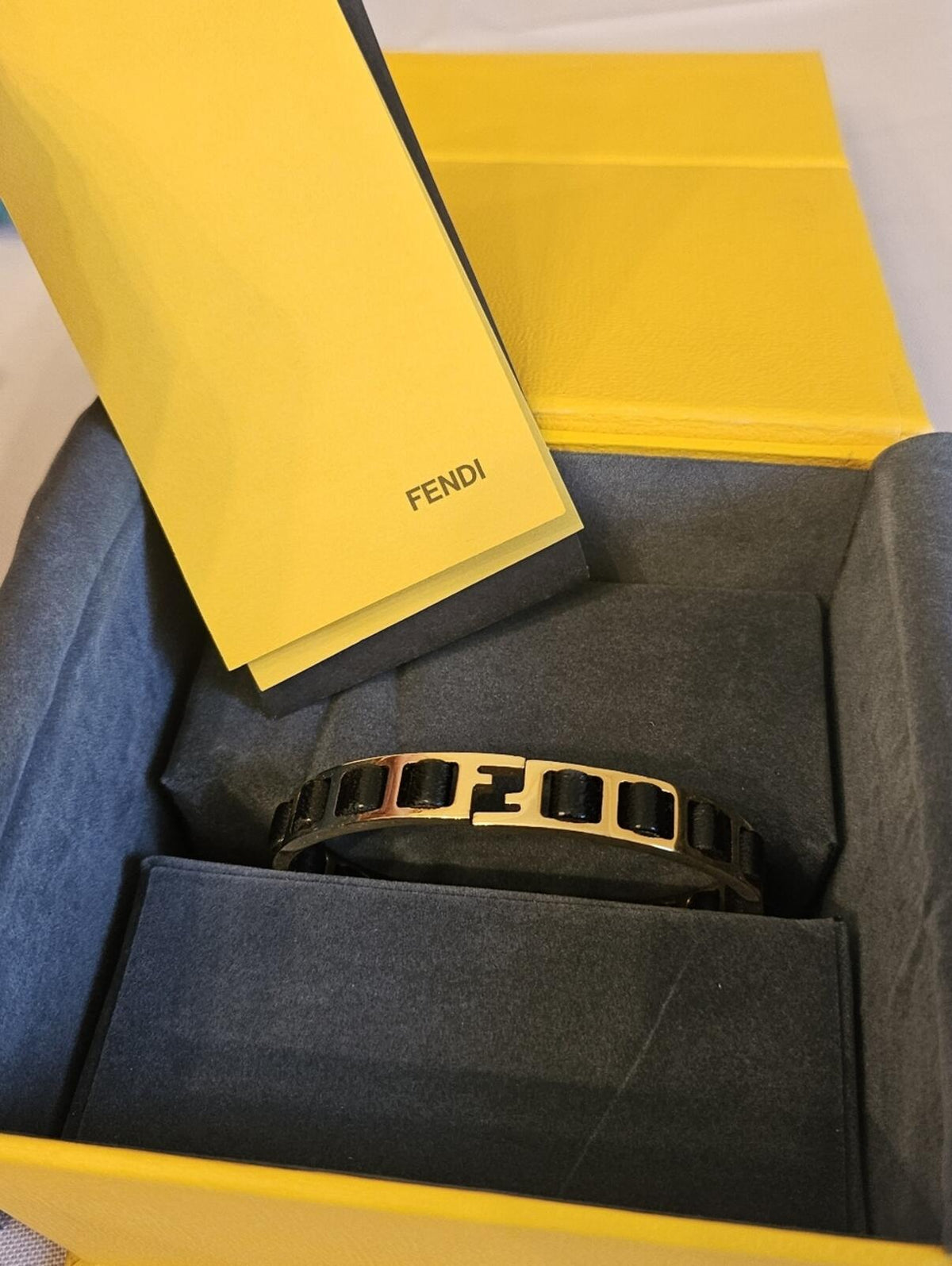 Fendi Gold Tone Black Leather FF Logo Hinged Bangle Bracelet w/ Box