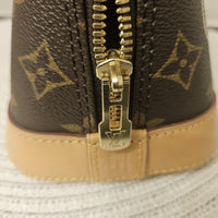 Louis Vuitton Alma BB World Tour Monogram Crossbody Bag